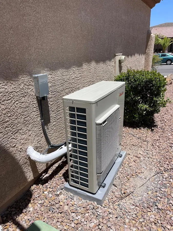 Residential air conditioning condenser unit in Smithville